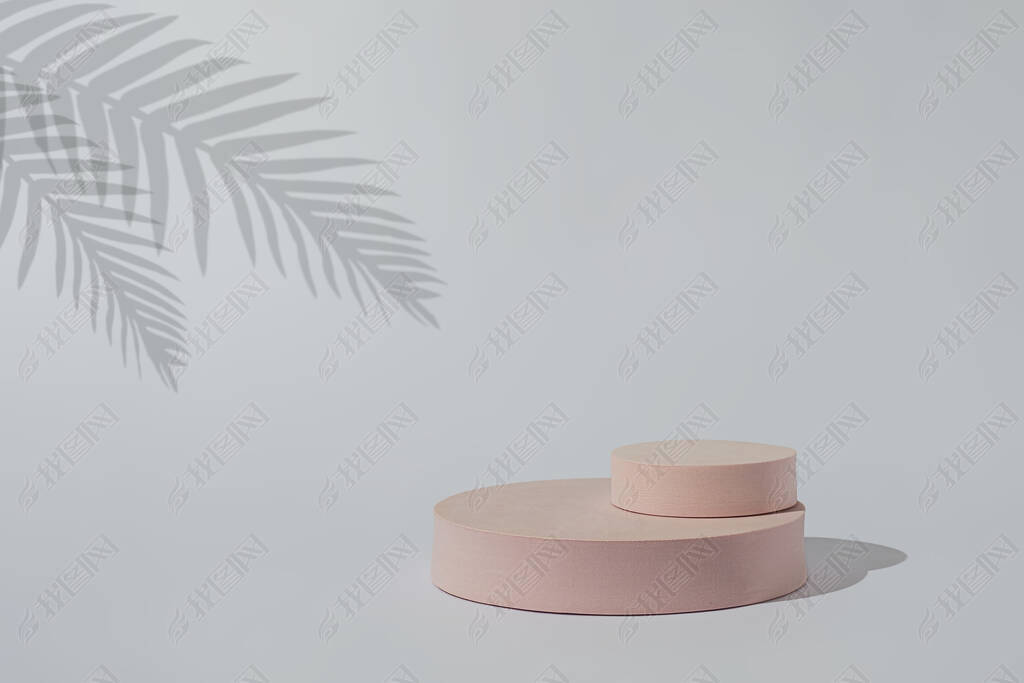 Mock up pedestal stand podium for demonstration and display of cosmetics and palm tree shade