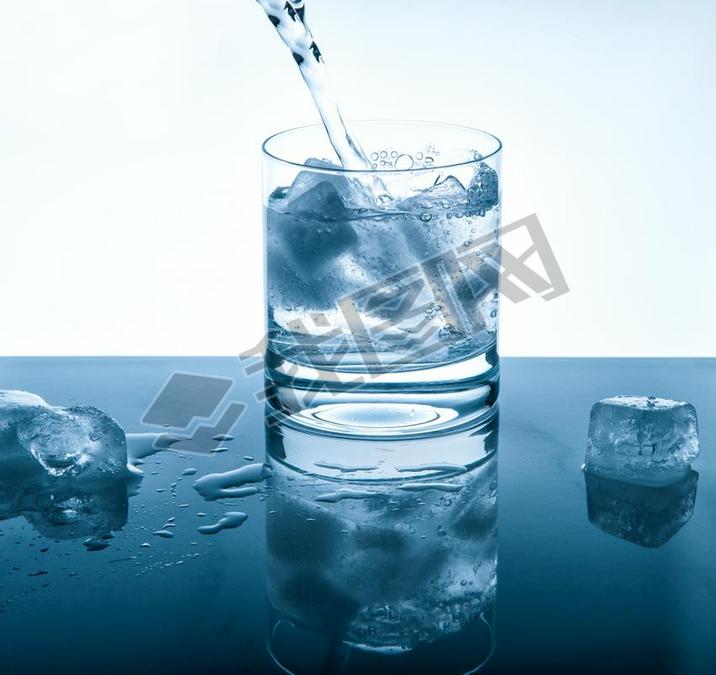 Water cold drink pouring into glass Blue colored