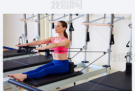 Pilates reformer woman stomach massage flat