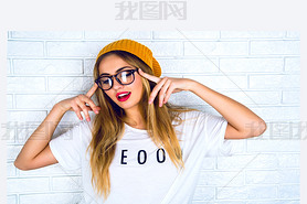 portrait of young hipster blonde woman