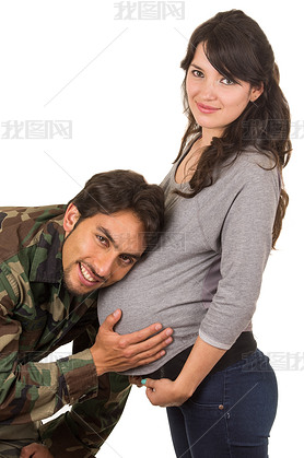 happy proud military soldier hugging pregnant wife