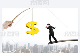 Man balancing golden dollar sign fishing lure with cityscape