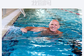 Active senior man swimming in the pool