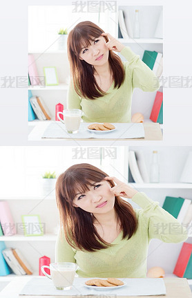 Asian girl thinking while hing breakfast