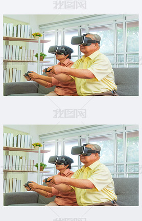 Senior Asian couple is playing Video game and wearing VR goggles for retirement technology lifestyle