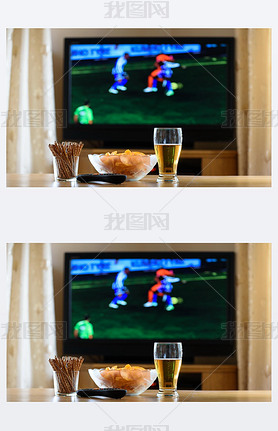 television, TV watching (football, soccer match) with snacks lyi