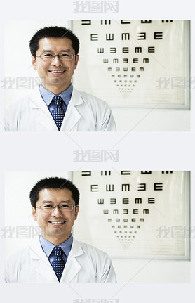 Optometrist with an eye chart in the background