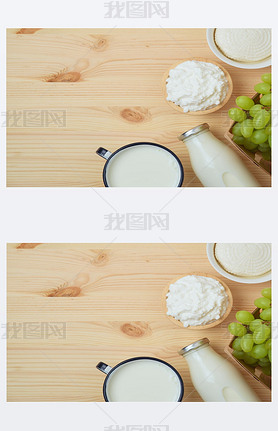 Milk and cheese, dairy products, fruits on wooden background. Jewish holiday Shuot concept. Top vi