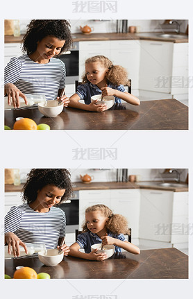 young african american woman in striped t-shirt pouring milk into bowl during breakfast with daughte