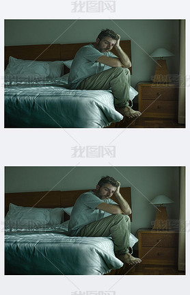 dramatic lifestyle portrait of handsome guy sitting on bed feeli