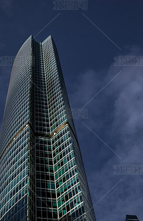 Modern office building in a big city. vertical shot