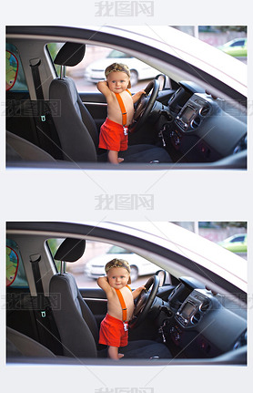 Small child holds a car wheel