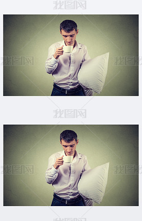 very tired, almost falling asleep business man holding a cup of coffee and pillow 