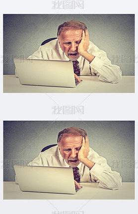 Tired sleepy senior man sitting at his desk in front of laptop computer