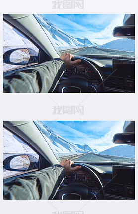 snowy mountains road view from the modern luxury car interior with drivers hand on steering wheel