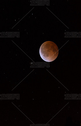 This is a photograph of the Lunar Eclipse Blood Moon moving out of its maximum stage at 3:00am Centr