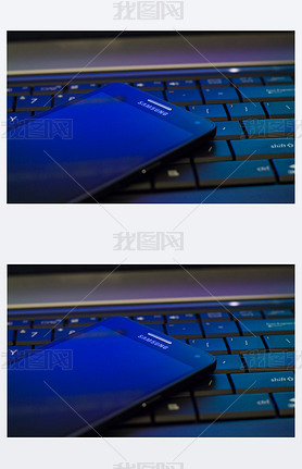 The Samsung Galaxy A5 laying on laptop keyboard