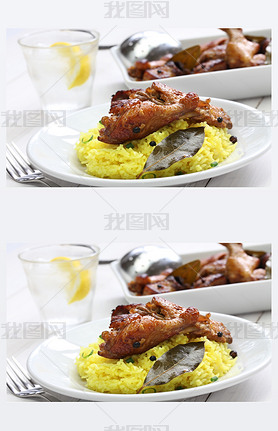 chicken and pork adobo over yellow rice, filipino food