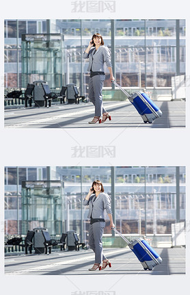 Smiling business woman walking with bag and mobile phone