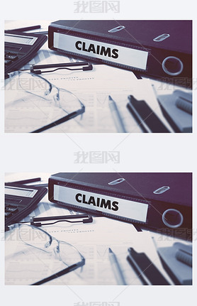 Claims on Ring Binder. Blured, Toned Image.