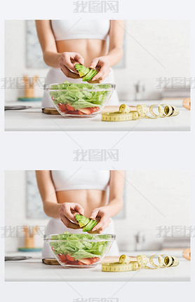 Cropped view of slim woman cooking salad with fresh vegetables and ocado near measuring tape on ki