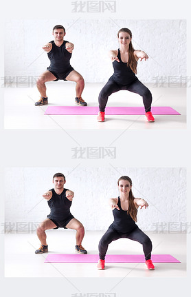 Fitness man and woman exercising squat exercise hands behind head looking at camera concept sport, t