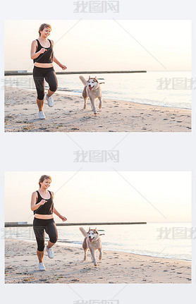 young caucasian female playing with siberian husky dog on beach during sunrise