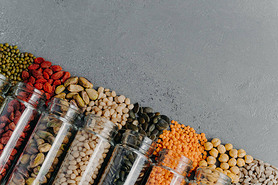 Zero waste. Organic grains in glass jars. Pumpkin seeds, chickpea, mung beans, lentils, goji berry, 