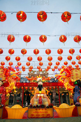 Original red lanterns in the blue sky and Godness lamp at evening at the Chinese New Year Celebratio