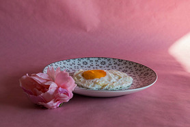 Homemade meal, Organic tasty cooked eggs for healthy breakfast on pink background, fancy ceramic pla