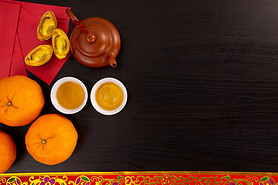 Flat lay Chinese new year mandarin orange and tea water with top view Copy space for celebrate china