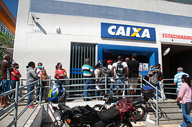 (Covid-19: Emergency Aid. April 29,2020, Cotia, Sao Paulo, Brazil: People face a queue at a bank bra