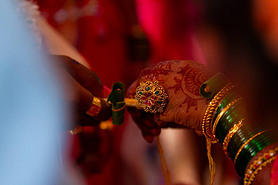 Brides hands with ring showing. indian wedding.