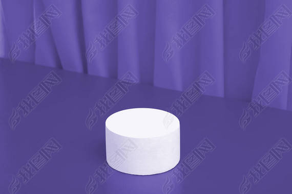 Podiums or pedestal Mock-up for cosmetic production on a very peri background with folds of fabric.