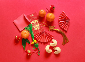 Red envelopes with Chinese symbols on color background. New Year celebration