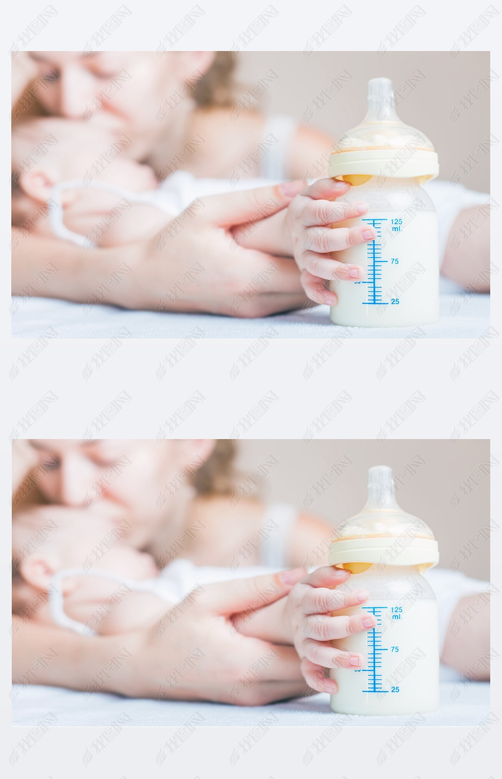 Baby holding a baby bottle with breast milk