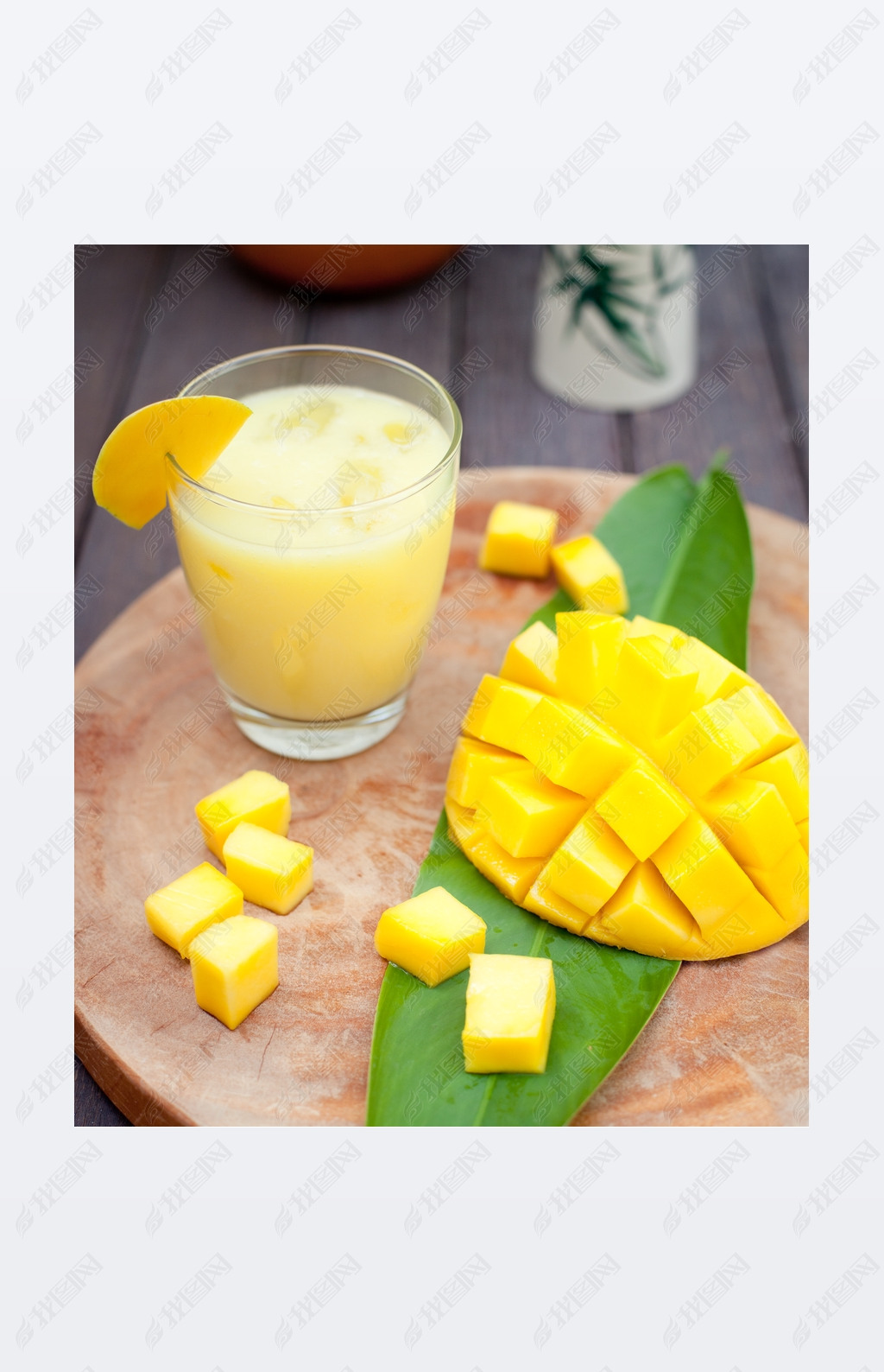 Mango juice, oothie ,mango fruit on a wooden background