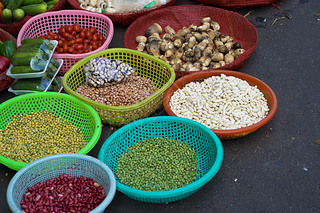 Various colorful beans at plastic basket at Ho Chi Minh City local market