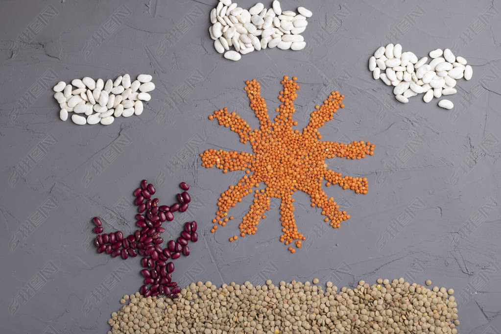 figures made of of beans and seeds. Top view and copy space