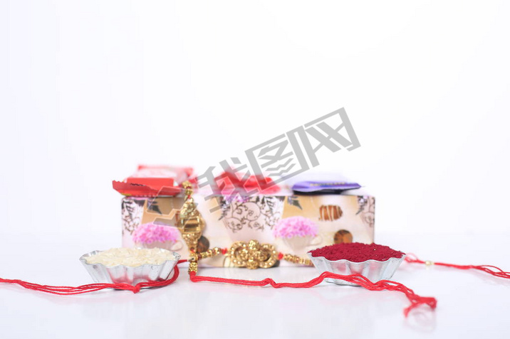 ӡȽڣRaksha BandhanŵRakhi  Rice GrainsKumkum ӡȴͳֵܽü䰮.