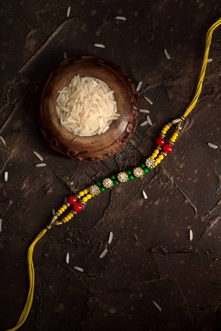 Raksha BandhanŵRakhi  Rice GrainsKumkum  ӡȴͳֵܽü䰮.