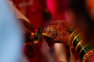 Brides hands with ring showing. indian wedding.