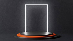 A stepped podium in black with an orange step in the middle. Large white light on a rectangular back