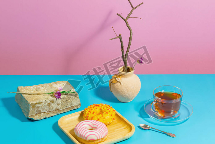 Tea with dessert on a bright colored background