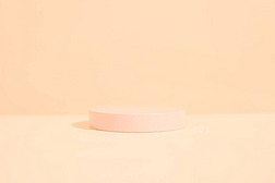 product platform arrangement in pink pastel color in minimalist style. trendy display layout with an