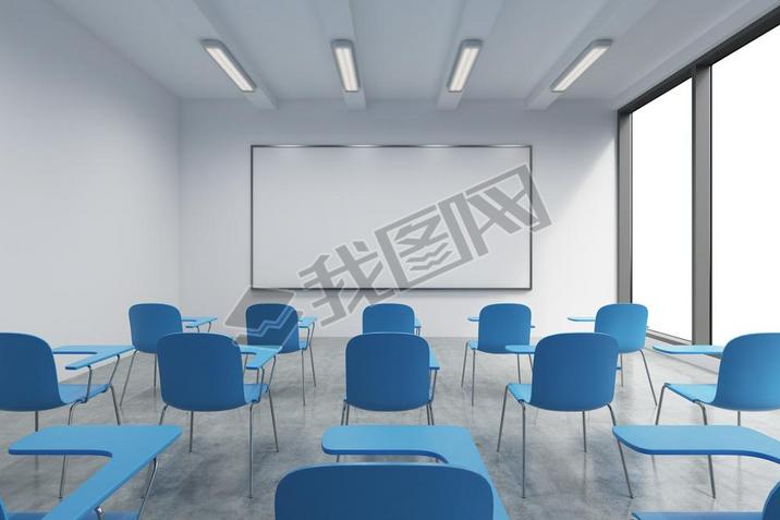 A classroom or presentation room in a modern university or fancy office. Blue chairs, a whiteboard o