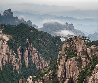 Huangshan mountain and Chinese style house at Yellow Mountain. China, Asia