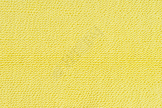 Neon yellow cloth texture closeup. Abstract textile detailed background.