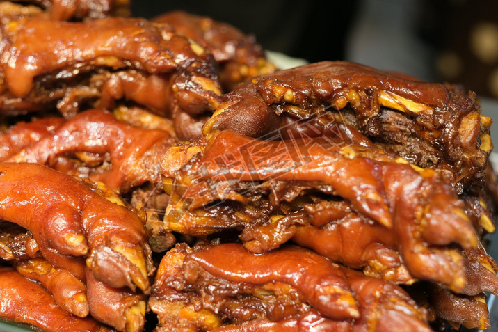 close up stack of pot-stewed pig's trotters. traditional Chinese food