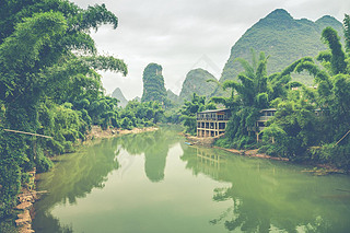 Scenic landscape at Yangshuo County of Guilin, China. View of beautiful karst mountains and the Li R